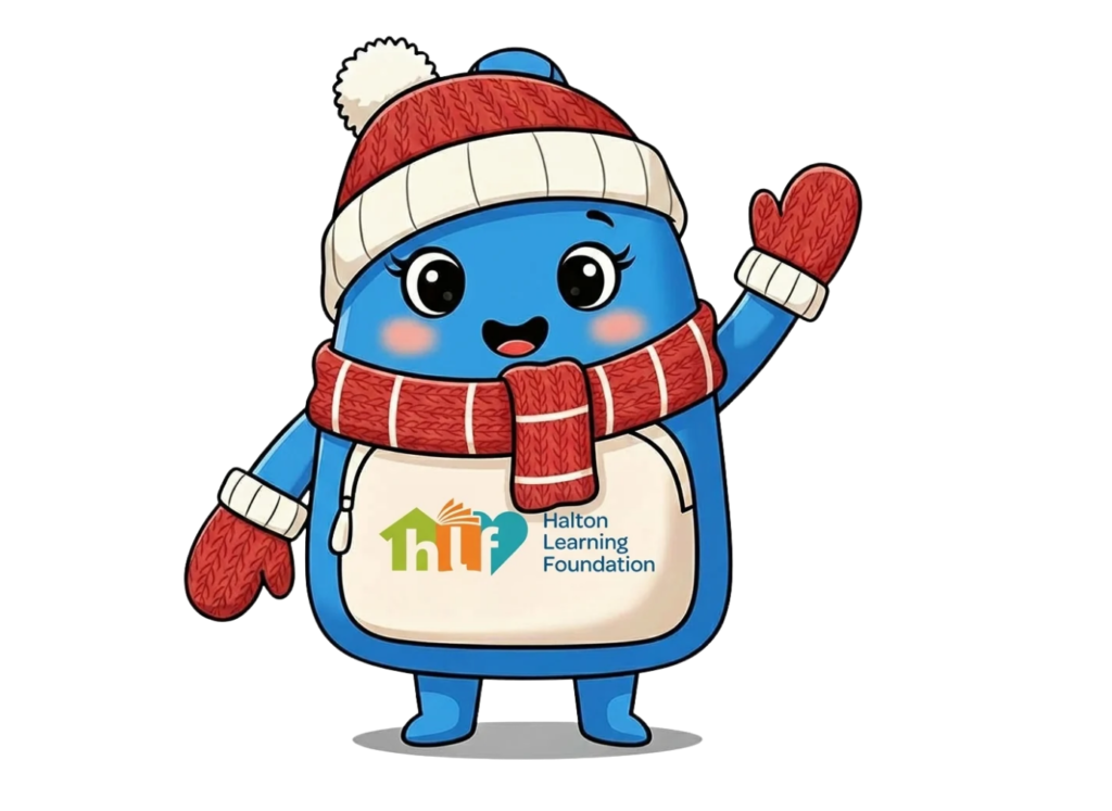 An Image of Carrie the Backpach, an animated mascot and a cheerful helper for the Halton Learning Foundation. Carrie is wearing a read beanie, scarf and mittens.